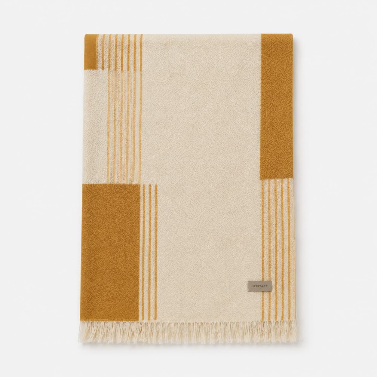 Folded textiles on a stone surface